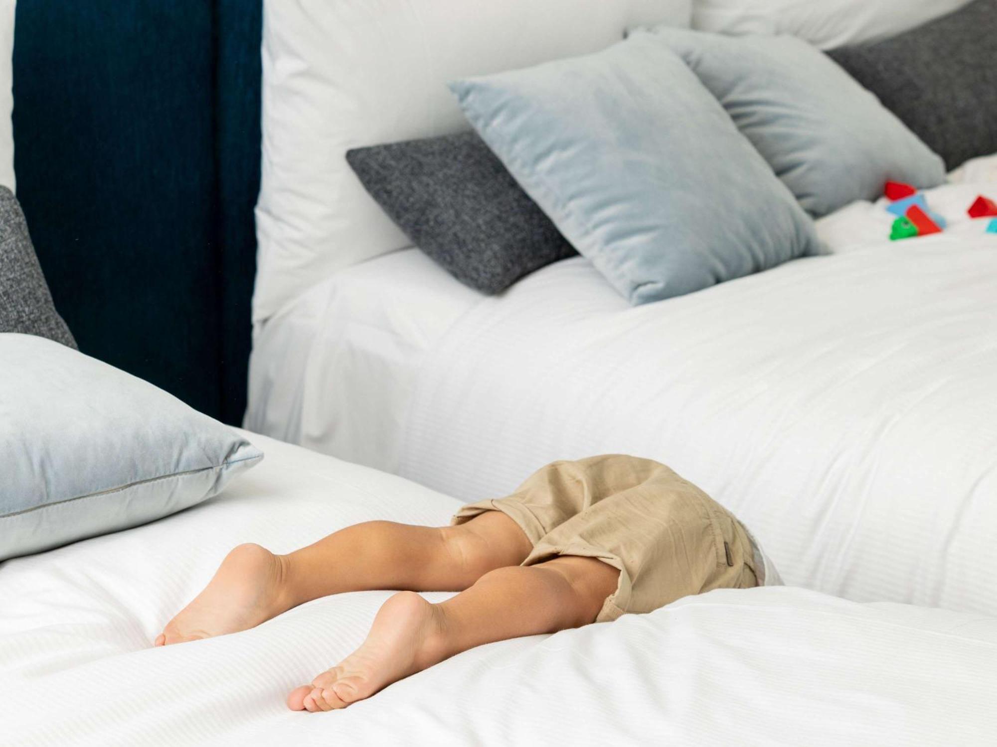 Hotel Chadstone Melbourne Mgallery Collection Zewnętrze zdjęcie A child playing hide-and-seek